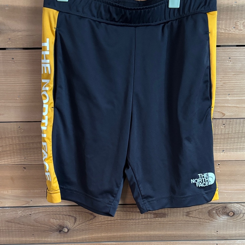 The North Face Black and Gold Athletic Shorts